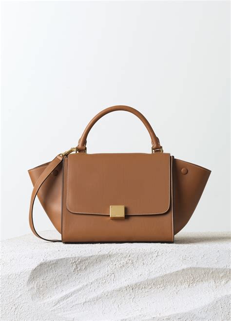 celine small trapeze bag in textile|celine belt bag street style.